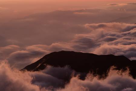 Sunset over the Andean mountains in Ecuador. Cimborazo province, about 5000m of altitude. Place considered to be the closest point to the sun.の写真素材