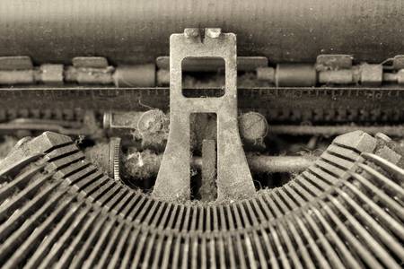 Detail of a an rusty old typewriter mechanism , monochromeの写真素材