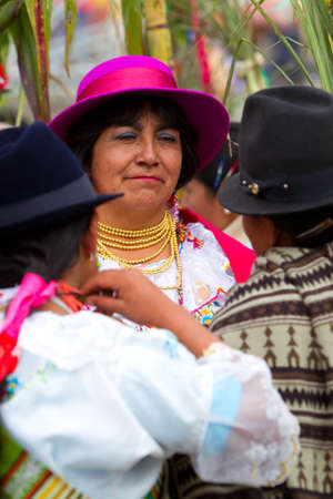 PUJILI,ECUADOR - 25 JUNE 2011: womens dressed up in traditional costumes for Inti Raymi festival that is celebrated on 25 JUNE 2011 のeditorial素材