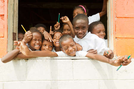 TAMBILLO,ECUADOR 7 SEPTEMBER 2011:living in a very small community young kids are very happy to see a new face in their village TAMBILLO,ECUADOR 7 SEPTEMBER 2011のeditorial素材