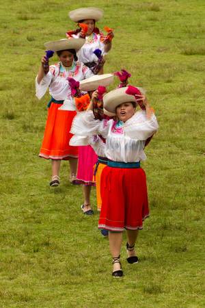 Lloa,Ecuador - 29 May 2011: Group of Ecuadorian dancers dressed up in traditional costumes dancing for the spring festival of Lloa,Ecuador - 29 May 2011のeditorial素材