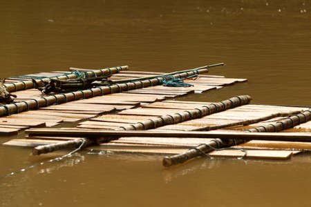 Timber carried down on the riverの写真素材
