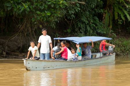 Puni Bocana,Ecuador - November 16,2012:Group of people comes to the local food market by canoe, the main trasnportation in Ecuadorian Amazoniaのeditorial素材