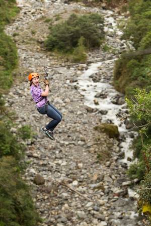 zipline adventure in ecuadorian rainforest, banos de agua santaの写真素材