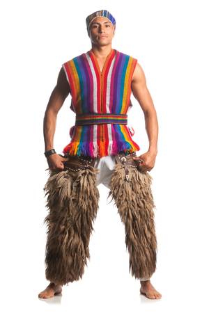 ecuadorian dancer dressed up in traditional costume from the highlands, llama or alpaca pants. studio shot isolated on white.の写真素材