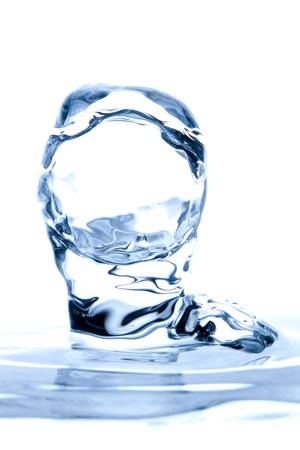 water drop inpact on the liquid surface, white background