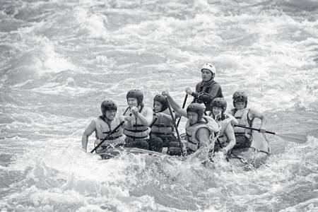 a group of men and women, with a guide, white water rafting on the patate river, ecuadorの写真素材