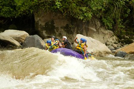 a group of men and women, with a guide, white water rafting on the patate river, ecuadorの写真素材