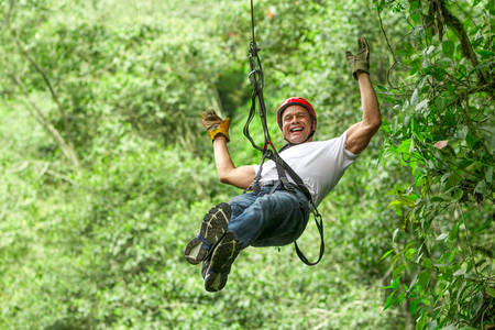 adult man on zip line, ecuadorian andesの写真素材