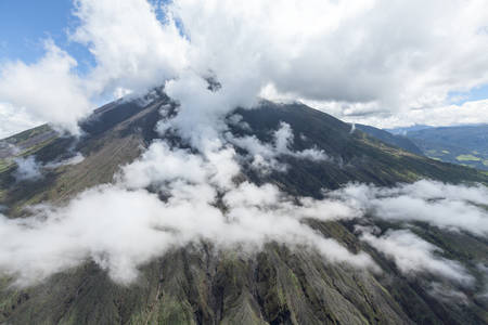 helicopter shot of tungurahua volcano, ecuadorの写真素材