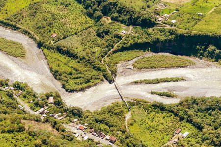 Pastaza river valley in Ecuadorian Andes and Pan American road, high altitude full size helicopter shotの写真素材