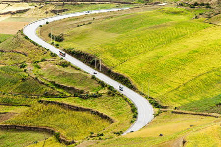 High altitude road in Ecuador crossing agricultural landscapeの写真素材