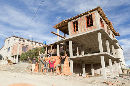 Quilotoa, Ecuador - 16 October 2012: Group Photo Of A Construction Team Near Quilotoa Crater In Ecuador A Booming Touristic Destination In Quilotoa On October 16, 2012のeditorial素材