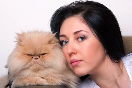 Beautiful Lady With Her Cat Face Portrait Close Upの写真素材