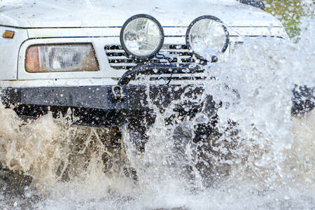 4X4 Car Off Road Driving Into The Waterの写真素材
