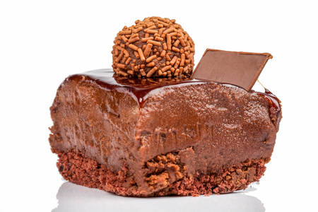 Delicious Cake With Cocoa Cream Isolated On White Studio Shot