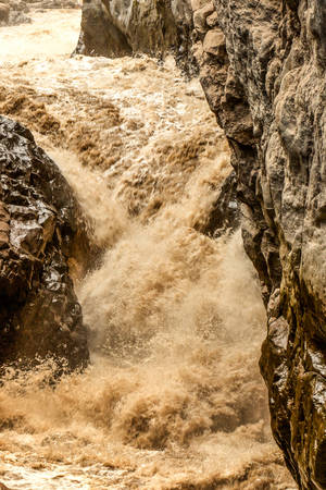 river full with volcanic ash after the explosion of tungurahua volcano ecuador