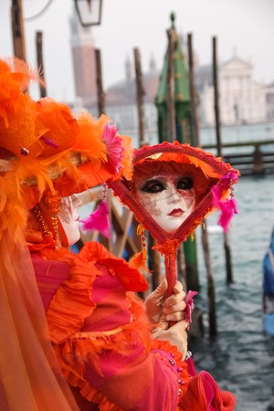 VENICE, ITALY - FEBRUARY 1, 2008: Unidentified person with Venetian carnival mask in Venice, Italy. At 2008 it is held from January 26th to February 5th.のeditorial素材