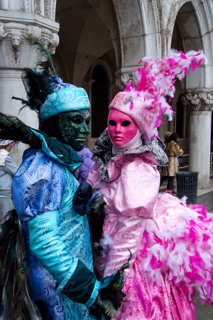 VENICE, ITALY - FEBRUARY 5, 2008: Unidentified person with Venetian carnival mask in Venice, Italy. At 2008 it is held from January 26th to February 5th.のeditorial素材