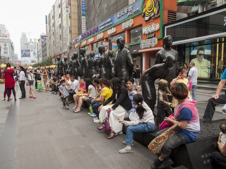 CHENGDU, CHINA - MAY 27, 2012: Unidentified people on the street of Chengdu, China. With more than 14 million people, Chengdu is the fourth most populous city in mainland China.のeditorial素材
