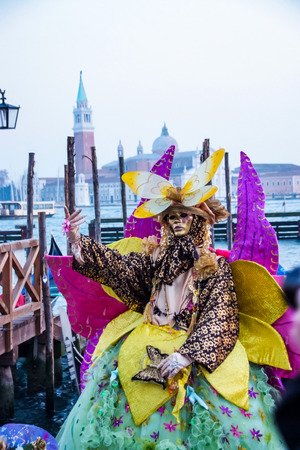 VENICE, ITALY - FEBRUARY 1, 2008: Unidentified person with Venetian carnival mask in Venice, Italy. At 2008 it is held from January 26th to February 5th.のeditorial素材