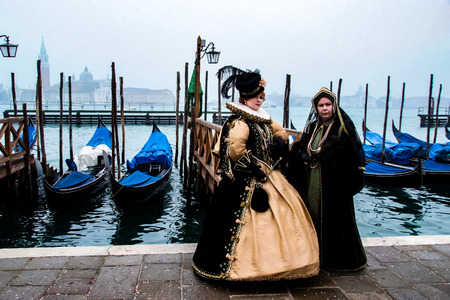 VENICE, ITALY - FEBRUARY 1, 2008: Unidentified person with Venetian carnival mask in Venice, Italy. At 2008 it is held from January 26th to February 5th.のeditorial素材