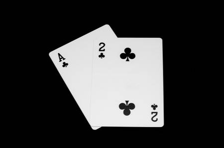 ace and number two clover card isolated on black background