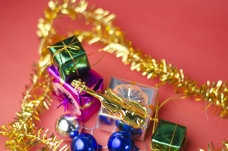item decorate for christmas tree on red backgroundの写真素材