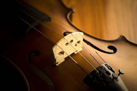 "time to practice violin" violin in vintage style on wood backgroundの写真素材