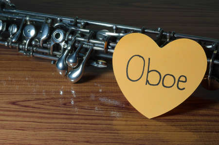 oboe with heart n wood backgroundの写真素材