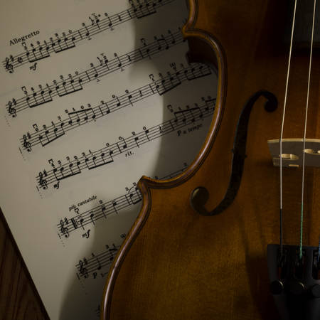 "time to practice violin" violin with sheet music on vintage styleの写真素材
