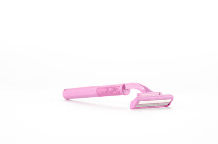 pink disposable shaving on a white backgroundの写真素材