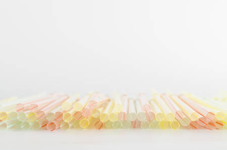 colorful straw on a white の写真素材