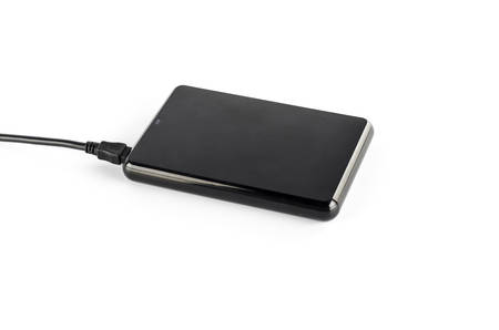 black external hard disk on a white 
