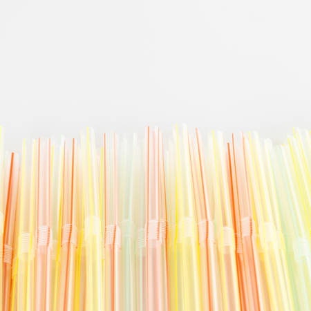 colorful straw on a white の写真素材