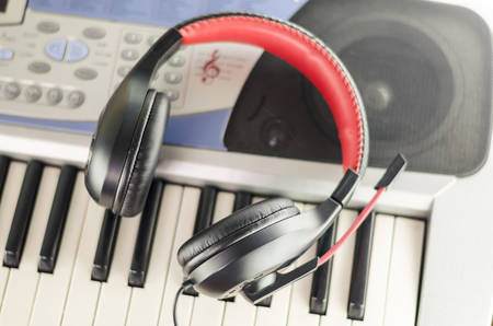 headphones on electric  music instrument piano keyboard