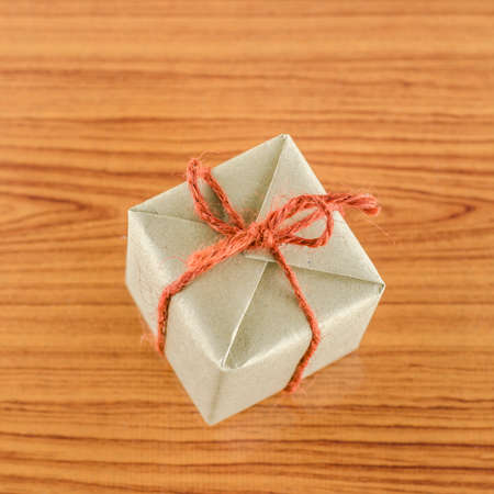 brown gift box on wooden background