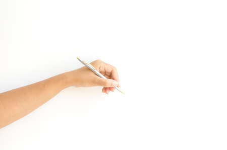 female hand writing on a white backgroundの写真素材