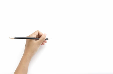 asia woman left hand writing on a white backgroundの写真素材