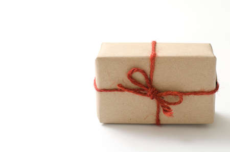 single craft cardboard gift box on a white backgroundの写真素材