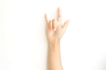 asia woman hand sign I love you symbol on a white backgroundの写真素材