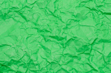 texture of wrinkled green paper backgroundの写真素材