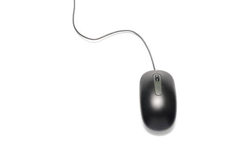 black computer mouse on a white backgroundの写真素材