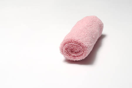 pink towel on a white backgroundの写真素材