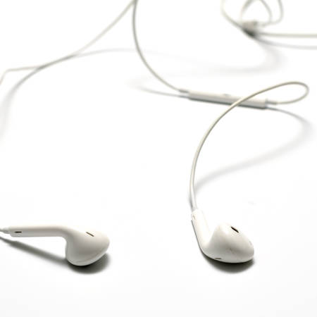 white earphones on a white backgroundの写真素材