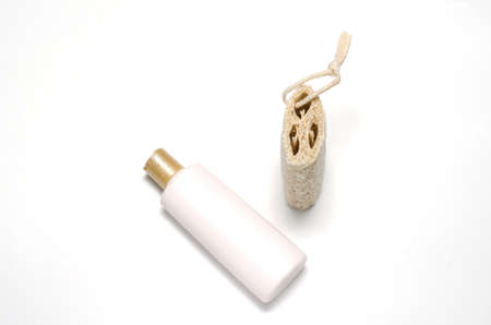 loofah and liquid soap isolated on a white backgroundの写真素材