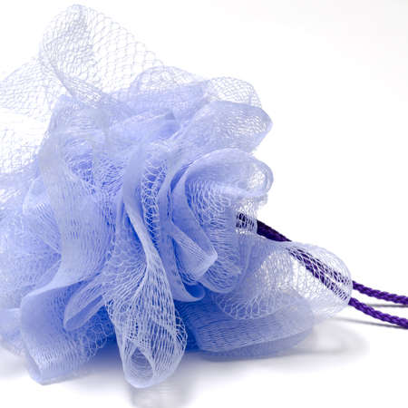 purple bath puff isolated on a white backgroundの写真素材