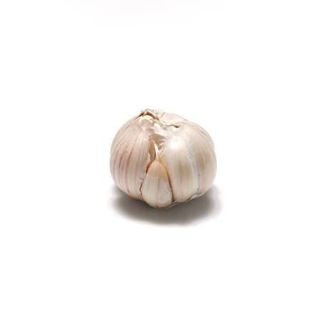 fresh garlic isolated on a white の写真素材