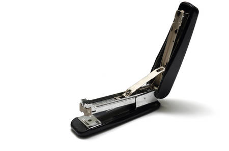 black stapler on a white backgroundの写真素材