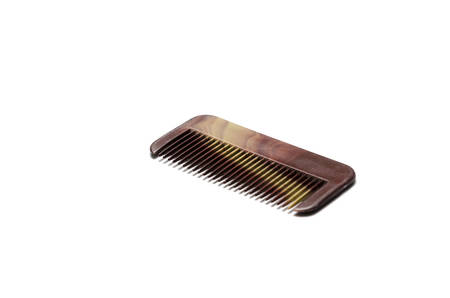 used comb on white background